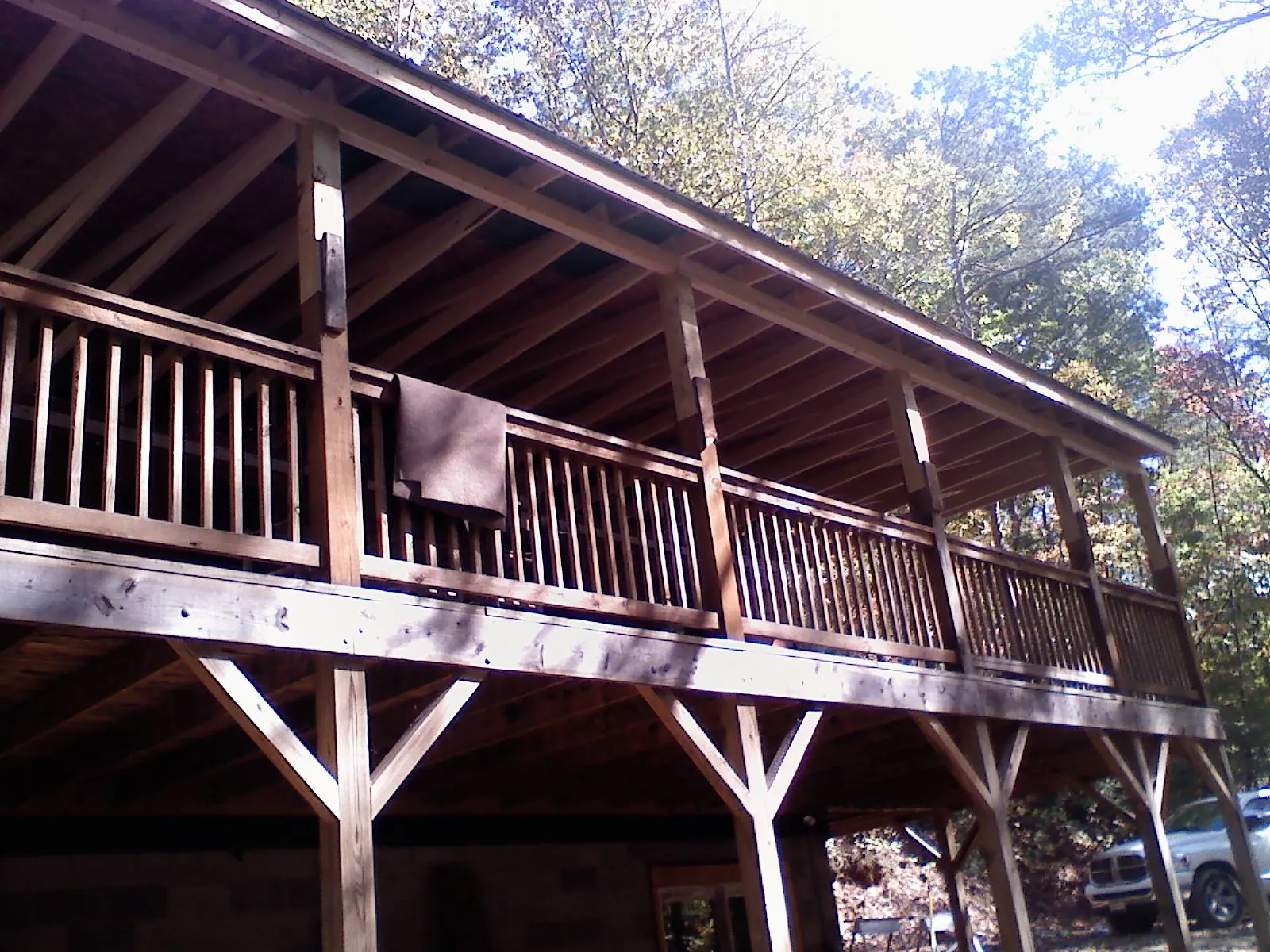 Timber framing under a new elevated porch and deck — Roof Leak Repair in Stacy by Roofing Brothers